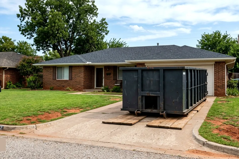 After photo of a clean swept residential garage and driveway in Lawton OK after dumpster haul-off